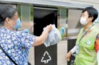 垃圾分类热情高 “要我分”变“我要分”-环保卫士